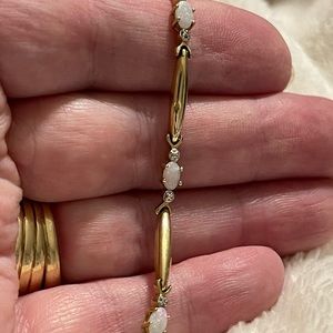 10k gold genuine Opal and diamond bracelet. 7”